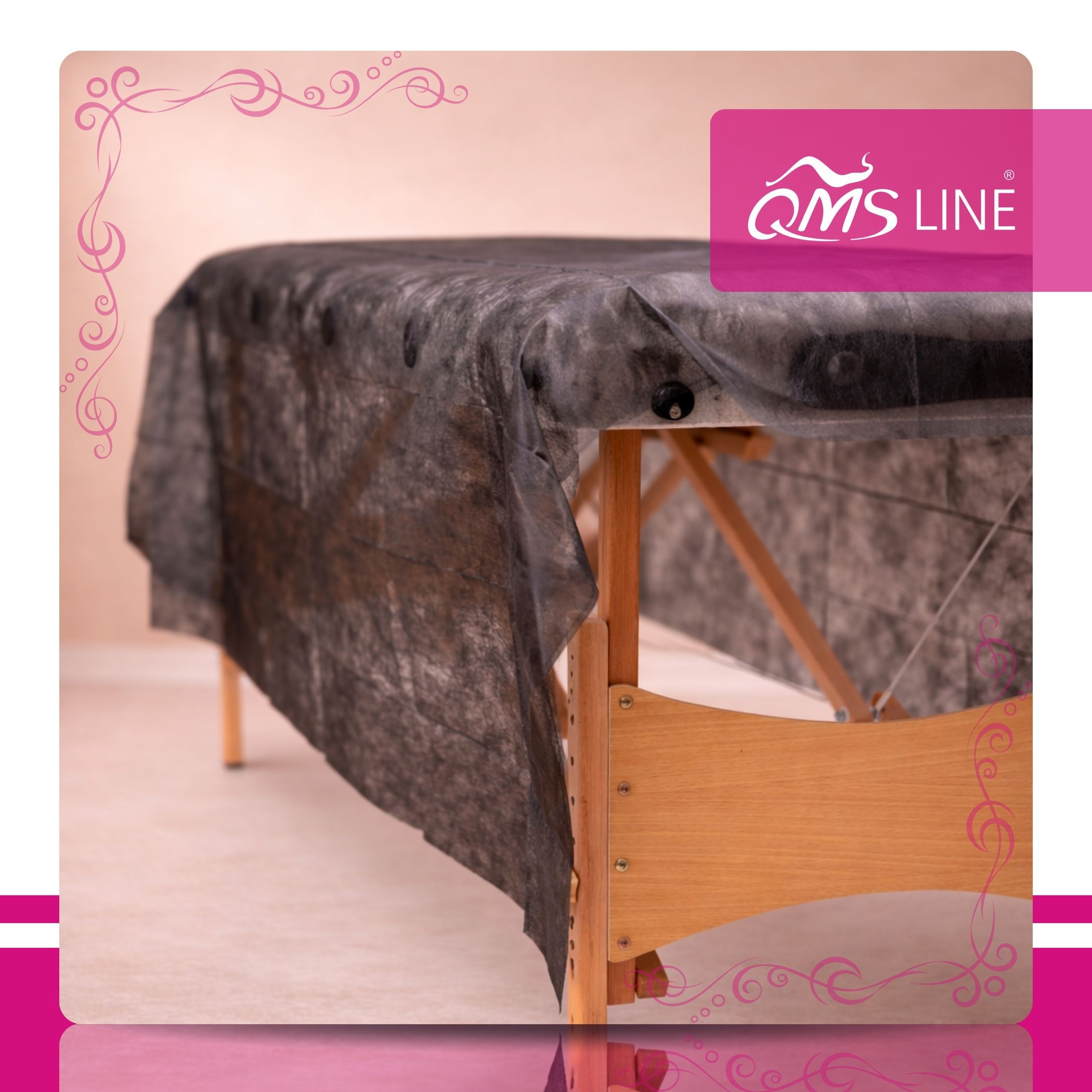 Prześcieradło włókninowe jednorazowe składane czarne 100 × 215 cm 18 g QMS Line Standard 10 szt. – elegancka ochrona szerszych leżanek i stanowisk zabiegowych - obrazek 4